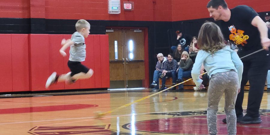 Students jumping rope during a fundraiser for heart health month.