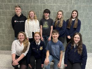 Students pose for their picture at an FFA competition.