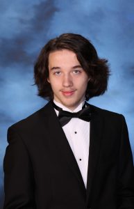 A snapshot of Jeffrey Lillard posing for his senior picture portrait.
